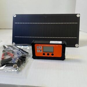 Solar Charge Controller with Black and Orange Panel